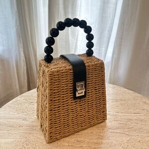 Chic Black and Tan Woven Handbag